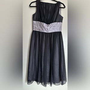 Modern does retro Maggy London black and silver dress. Size 6.